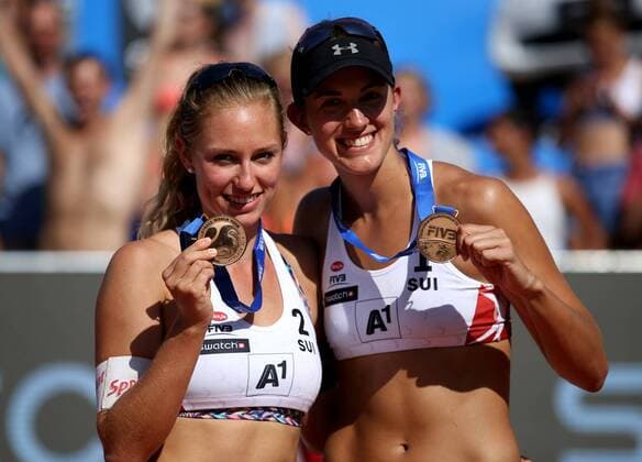 BEACHVOLLEYBALL - A1 Major Klagenfurt 2016 KLAGENFURT,AUSTRIA,30.JUL.16 - Beach volleyball Beachvolleyball - FIVB World Tour 2016, A1 Major Klagenfurt, women, award ceremony. Image shows the rejoicing of Nina Betschart and Tanja Hueberli (SUI). GEPAxpictures xDanielxGoetzhaber