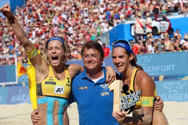 BEACHVOLLEYBALL - A1 Major Klagenfurt 2016 KLAGENFURT,AUSTRIA,30.JUL.16 - Beach volleyball Beachvolleyball - FIVB World Tour 2016, A1 Major Klagenfurt, women. Image shows the rejoicing of Laura Ludwig and Kira Walkenhorst (GER) and Hannes Jagerhofer (ACTS). GEPAxpictures xMaticxKlansek