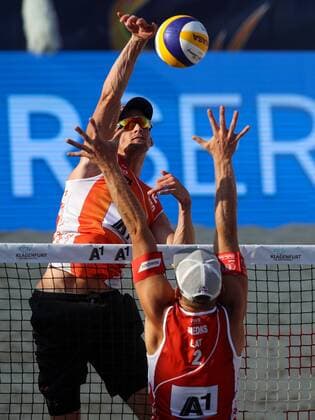BEACHVOLLEYBALL - A1 Major Klagenfurt 2016 KLAGENFURT,AUSTRIA,30.JUL.16 - Beach volleyball Beachvolleyball - FIVB World Tour 2016, A1 Major Klagenfurt, men. Image shows Robert Meeuwsen (NED) and Janis Smedins (LAT). GEPAxpictures xMaticxKlansek