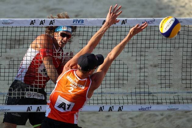 BEACHVOLLEYBALL - A1 Major Klagenfurt 2016 KLAGENFURT,AUSTRIA,30.JUL.16 - Beach volleyball Beachvolleyball - FIVB World Tour 2016, A1 Major Klagenfurt, men. Image shows Aleksandrs Samoilovs (LAT) and Robert Meeuwsen (NED). GEPAxpictures xMaticxKlansek