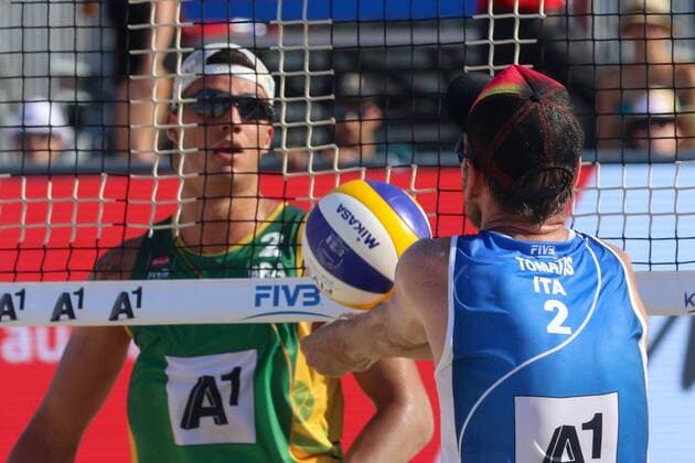 BEACHVOLLEYBALL - A1 Major Klagenfurt 2016 KLAGENFURT,AUSTRIA,30.JUL.16 - Beach volleyball Beachvolleyball - FIVB World Tour 2016, A1 Major Klagenfurt, men. Image shows Andrea Tomatis (ITA) and Saymon Barbosa Santos (BRA). GEPAxpictures xMaticxKlansek