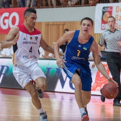 30.07.2016, xomx, Basketball Testspiel, Deutschland - Ukraine emspor, v.l. Maodo Lo (Deutschland), Denys Lukashov (Ukraine) Wuerzburg