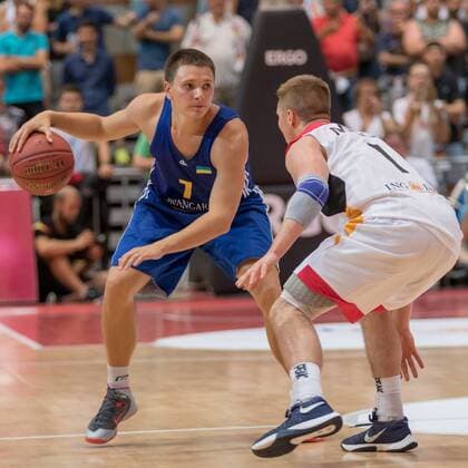 30.07.2016, xomx, Basketball Testspiel, Deutschland - Ukraine emspor, v.l. Denys Lukashov (Ukraine), Makai Mason (Deutschland) Wuerzburg