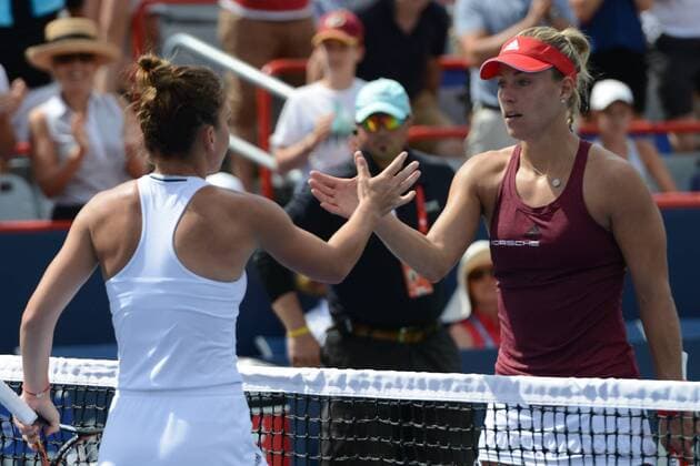 July 30, 2016 - Montreal, Canada - SIMONA HALEP and ANGELIQUE KERBER meet at the net after their semifinal match vs. A. Kerber in the Rogers Cup Tennis Tournament. Tennis 2016 - Rogers Cup - Day 6 - ZUMAl132