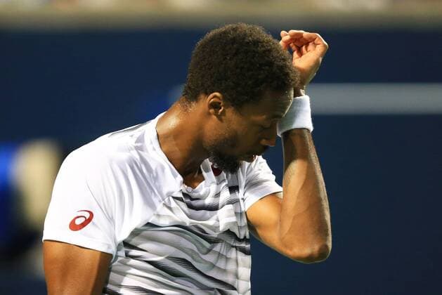(160731) -- TORONTO, July 30, 2016 -- Gael Monfils of France reacts during the semifinal match of men s singles against Novak Djokovic of Serbia at the 2016 Rogers Cup in Toronto, Canada, July 30, 2016. Gael Monfils lost 0-2. ) (SP)CANADA-TORONTO-TENNIS-ROGERS CUP-MEN S SINGLES ZouxZheng 