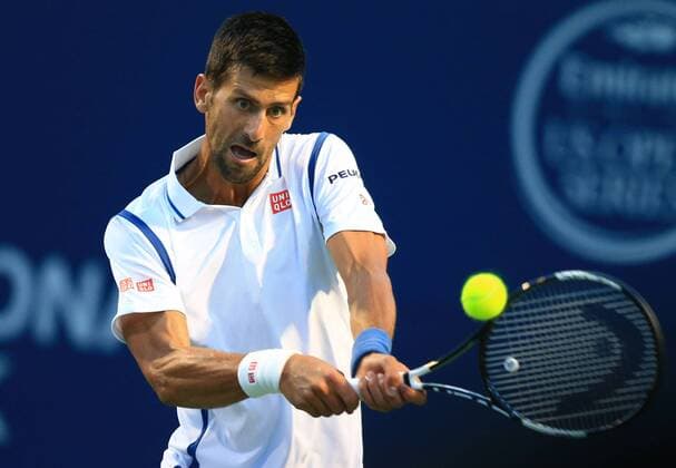 (160731) -- TORONTO, July 30, 2016 -- Novak Djokovic of Serbia returns the ball against Gael Monfils of France during the semifinal match of men s singles at the 2016 Rogers Cup in Toronto, Canada, July 30, 2016. Novak Djokovic won 2-0. ) (SP)CANADA-TORONTO-TENNIS-ROGERS CUP-MEN S SINGLES ZouxZheng 