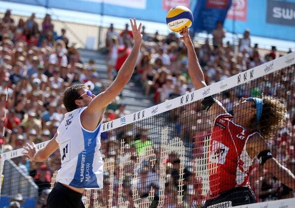 BEACHVOLLEYBALL - A1 Major Klagenfurt 2016 KLAGENFURT,AUSTRIA,31.JUL.16 - Beach volleyball Beachvolleyball - FIVB World Tour 2016, A1 Major Klagenfurt, men. Image shows Ben Saxton (CAN) and Aleksandrs Samoilovs (LAT). GEPAxpictures xDanielxGoetzhaber