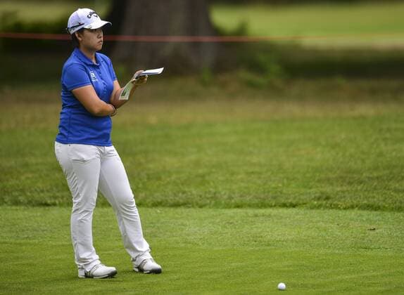 31.07.2016. Woburn Golf Course, Milton Keynes, England. Ricoh Womens Open Golf, final round. Hee-Kyung Bae (Korea) consults her course notes before playing from the fairway on the 4th. xAndrewxThompsonx  ActionPlus11766915