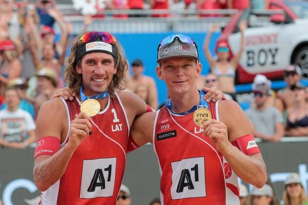 BEACHVOLLEYBALL - A1 Major Klagenfurt 2016 KLAGENFURT,AUSTRIA,31.JUL.16 - Beach volleyball Beachvolleyball - FIVB World Tour 2016, A1 Major Klagenfurt, men, award ceremony. Image shows Aleksandrs Samoilovs and Janis Smedins (LAT). GEPAxpictures xMaticxKlansek