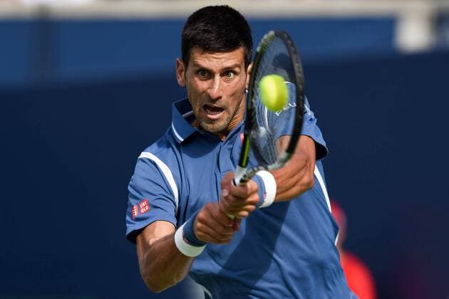 July 31, 2016: Novak Djokovic of Serbia & Montenegro returns the ball to Kei Nishikori of Japan during the Rogers Cup tournament final at the Aviva Centre in Toronto, Ontario, Canada on July 31, 2016. Cal Media TENNIS 2016 - Rogers Cup Toronto Final July 31 - ZUMAc04_
