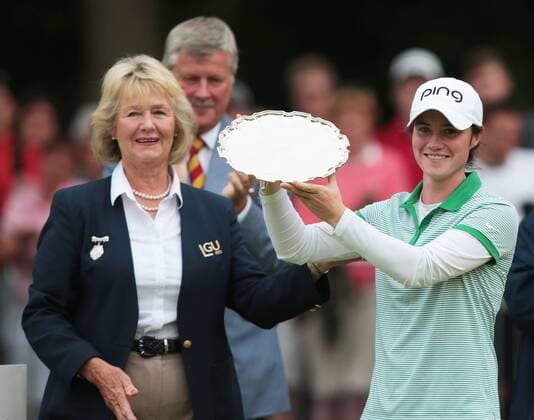July 31, 2016 - Woburn, United Kingdom - Leona Maguire of Ireland is presented with the trophy for the leading amateur player by Diane Bailey The Presidient of the LGU during the final round of the 2016 Ricoh Women s British Open played at Woburn Golf and Country Club, Woburn on July 31st 2016. Ricoh Women s British Open 2016 Day Four  - ZUMAn230