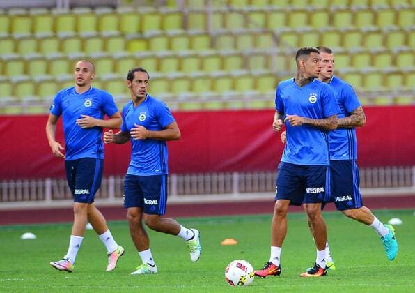 Fenerbahce players during a training session at Stade Louis II Stadium in Monaco on August 02, 2016, a day before their UEFA Champions League Third qualifying round second leg match agaimnst Monaco. Pictured: L-R , Aatif Chahechouhe , Yasir Subasi , Gregory van der Wiel and Martin Skrtel. 