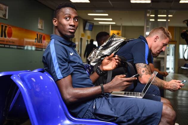 Genk s Wilfried Onyinye Ndidi and Genk s Sebastien Dewaest pictured at the departure of Belgian first league soccer team KRC Genk, in Maastricht airport, on their way to Cork, Ireland, Wednesday 03 August 2016. Tomorrow Genk is playing the return leg of the third qualifying round in the Europa League competition against Ireland s Cork City F.C.. First leg result was 1-0 for Genk. LUCxCLAESSEN  x04902463x