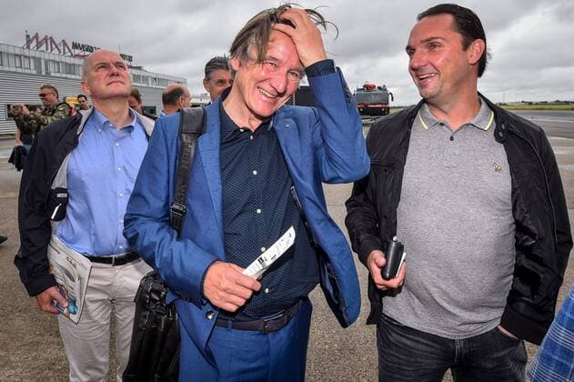 Genk s general director Patrick Janssens and Genk s technical director Dimitri De Conde pictured at the departure of Belgian first league soccer team KRC Genk, in Maastricht airport, on their way to Cork, Ireland, Wednesday 03 August 2016. Tomorrow Genk is playing the return leg of the third qualifying round in the Europa League competition against Ireland s Cork City F.C.. First leg result was 1-0 for Genk. LUCxCLAESSEN  x04902472x