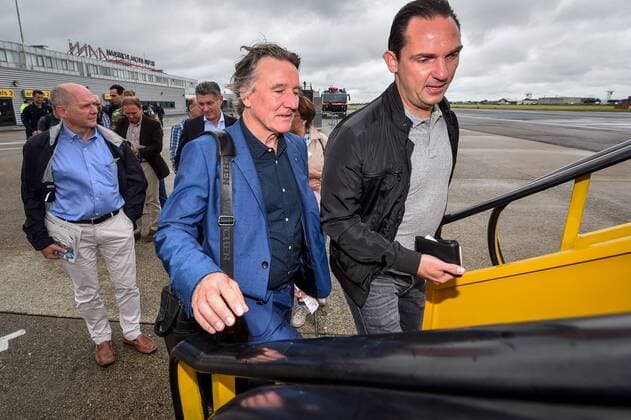 Genk s general director Patrick Janssens and Genk s technical director Dimitri De Conde pictured at the departure of Belgian first league soccer team KRC Genk, in Maastricht airport, on their way to Cork, Ireland, Wednesday 03 August 2016. Tomorrow Genk is playing the return leg of the third qualifying round in the Europa League competition against Ireland s Cork City F.C.. First leg result was 1-0 for Genk. LUCxCLAESSEN  x04902471x