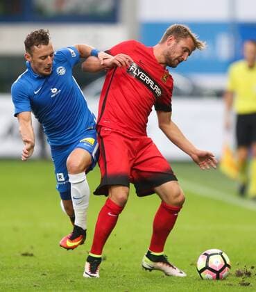 SOCCER - UEFA EL quali, Liberec vs Admira LIBEREC,CZECH REPUBLIC,03.AUG.16 - SOCCER - UEFA Europa League, qualification, Slovan Liberec vs FC Admira Wacker Moedling. Image shows Vladimir Coufal (Liberec) and Lukas Grozurek (Admira). GEPAxpictures xPhilippxBrem