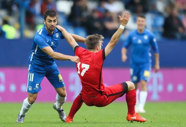 SOCCER - UEFA EL quali, Liberec vs Admira LIBEREC,CZECH REPUBLIC,03.AUG.16 - SOCCER - UEFA Europa League, qualification, Slovan Liberec vs FC Admira Wacker Moedling. Image shows David Hovorka (Liberec) and Dominik Starkl (Admira). GEPAxpictures xPhilippxBrem