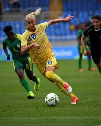 (160803) -- RIO DE JANEIRO, Aug. 3, 2016 -- Sofia Jakobsson (R) of Sweden competes during the opening match of the women s Olympic football competitions against South Africa at the Olympic Stadium in Rio de Janeiro, Brazil, Aug. 3, 2016. Sweden won 1-0. ) (SP)BRAZIL-RIO DE JANEIRO-OLYMPICS-WOMNE S FOOTBALL-SWEDEN VS SOUTH AFRICA YanxYan 