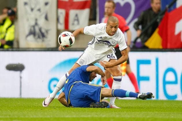 Rostov s Timofei Kalachev and Anderlecht s Sofiane Hanni fight for the ball during the return leg of the third qualification round for the Champions League competition between Belgian first league soccer team RSC Anderlecht and Russian team FC Rostov in Brussels, Wednesday 03 August 2016. The first leg ended in a 2-2 draw. BRUNOxFAHY  x04902899x