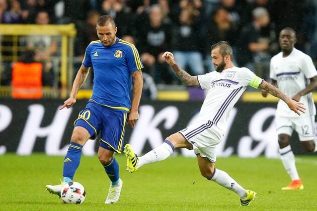 Rostov s Fedor Kudryashov and Anderlecht s Steven Defour fight for the ball during the return leg of the third qualification round for the Champions League competition between Belgian first league soccer team RSC Anderlecht and Russian team FC Rostov in Brussels, Wednesday 03 August 2016. The first leg ended in a 2-2 draw. BRUNOxFAHY  x04902888x