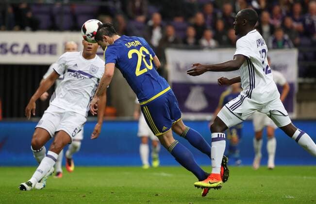 Rostov Sardar Azmoun and Anderlecht s Dennis Appiah fight for the ball during the return leg of the third qualification round for the Champions League competition between Belgian first league soccer team RSC Anderlecht and Russian team FC Rostov in Brussels, Wednesday 03 August 2016. The first leg ended in a 2-2 draw. VIRGINIExLEFOUR  x04902930x