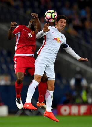 SOCCER - UEFA CL quali, RBS vs Tirana SALZBURG,AUSTRIA,03.AUG.16 - SOCCER - UEFA Champions League, qualification, Red Bull Salzburg vs FK Partizani Tirana. Image shows Sodiq Atanda (Tirana) and Jonatan Soriano (RBS). GEPAxpictures xFlorianxErtl