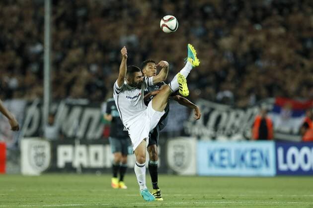(L-R) Giorgos Tzavellas of PAOK FC, Jairo Riedewald of Ajax during the UEFA Champions League third round qualifying second leg match between PAOK and Ajax Amsterdam on August 3, 2016 at the Stadio Toumba in Salonika, Greece. PAOK v Ajax UEFA Champions League third round 2016 2017 xVIxxIVx 5930362