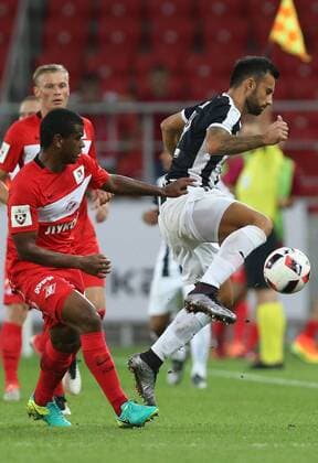 MOSCOW, RUSSIA - AUGUST 4, 2016: Spartak Moscow s Quincy Promes (10, left front), and AEK Larnaka s Ivan Trickovski (12, right front) in their 2016 2017 UEFA Europa League Third Qualifying Round football match at Otkrytie Arena. Artyom Korotayev TASS  TS02BD22