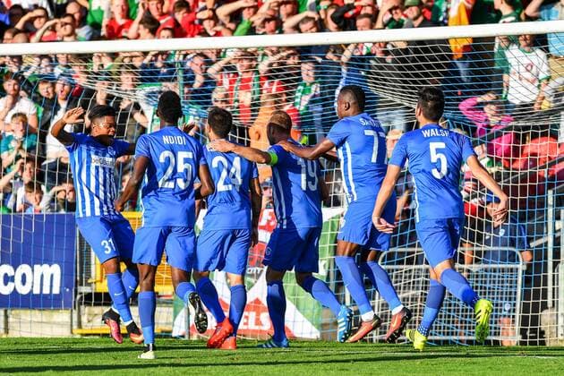 Genk s players celebrate after scoring during a soccer game between Ireland s Cork City F.C. and Belgium s KRC Genk, in Cork, Ireland, Thursday 04 August 2016, the return leg of the third qualifying round in the Europa League competition. The first leg ended in a 1-0 Genk victory. LUCxCLAESSEN  x04903555x