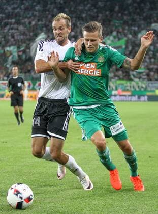 SOCCER - EL quali, Rapid vs Zhodino VIENNA,AUSTRIA,04.AUG.16 - SOCCER - UEFA Europa League, qualification, SK Rapid Wien vs FC Torpedo Zhodino. Image shows Maxym Imerekov (Schodsina) and Arnor Ingvi Traustason (Rapid)x. Keywords: Wien Energie. GEPAxpictures xMarioxKneisl
