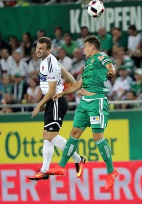 SOCCER - EL quali, Rapid vs Zhodino VIENNA,AUSTRIA,04.AUG.16 - SOCCER - UEFA Europa League, qualification, SK Rapid Wien vs FC Torpedo Zhodino. Image shows Serhiy Zagynailov (Zhodino) and Stefan Schwab (Rapid). Keywords: Wien Energie. GEPAxpictures xWalterxLuger