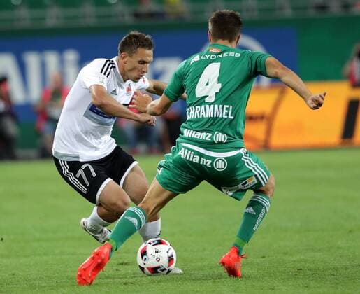 SOCCER - EL quali, Rapid vs Zhodino VIENNA,AUSTRIA,04.AUG.16 - SOCCER - UEFA Europa League, qualification, SK Rapid Wien vs FC Torpedo Zhodino. Image shows Mikhail Afanasiev (Zhodino) and Thomas Schrammel (Rapid). Keywords: Wien Energie. GEPAxpictures xWalterxLuger