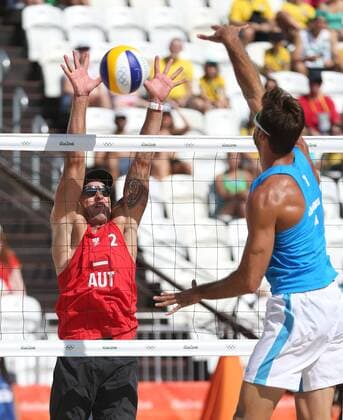 OLYMPICS - Olympic Summer Games 2016 RIO DE JANEIRO,BRAZIL,06.AUG.16 - OLYMPICS, Beach volleyball Beachvolleyball - Olympic Summer Games Rio 2016, preliminary round, men. Image shows Alexander Horst (AUT) and Adrian Ignacio Carambula Raurich (ITA). GEPAxpictures xHaraldxSteiner