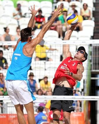 OLYMPICS - Olympic Summer Games 2016 RIO DE JANEIRO,BRAZIL,06.AUG.16 - OLYMPICS, Beach volleyball Beachvolleyball - Olympic Summer Games Rio 2016, preliminary round, men. Image shows Alex Ranghieri (ITA) and Alexander Horst (AUT). GEPAxpictures xHaraldxSteiner