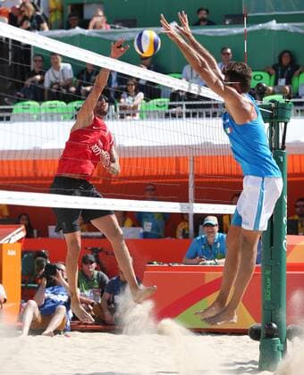 OLYMPICS - Olympic Summer Games 2016 RIO DE JANEIRO,BRAZIL,06.AUG.16 - OLYMPICS, Beach volleyball Beachvolleyball - Olympic Summer Games Rio 2016, preliminary round, men. Image shows Clemens Doppler (AUT) and Alex Ranghieri (ITA). GEPAxpictures xHaraldxSteiner