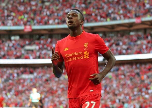 06.08.2016. Wembley Stadium, London, England. International Champions Cup Football. Liverpool versus Barcelona. Liverpool Forward Divock Origi celebrates after scoring Liverpool s third past Barcalona Goalkeeper Claudio Bravo, 3-0 xMarkxKertonx  ActionPlus11768719