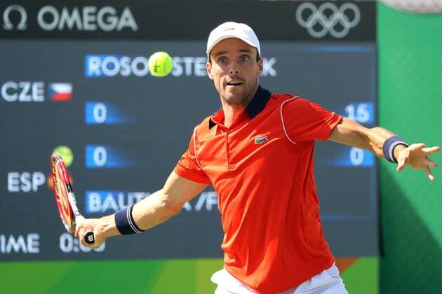Rio 2016, Tennis Spanish tennis player Roberto Bautista returns the ball to the Czech couple Radek Stepanek and Lukas Rosol during an Olympic Games Olympische Spiele Olympia OS Rio 2016 Men s Tennis Doubles First Round match at the Olympic Tennis Centre in Rio de Janeriro, Brazil, 6 August 2016. MEN S TENNIS IN RIO !ACHTUNG: NUR REDAKTIONELLE NUTZUNG!  RIO108 20160806-636061217761761610