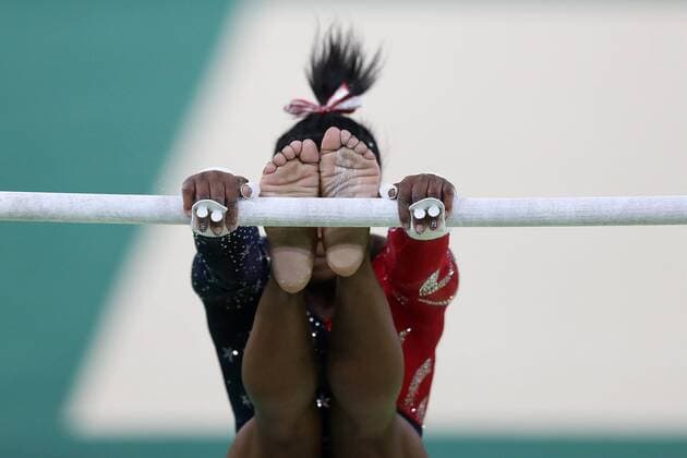 US. Simone Biles competes at the Olympic Games Olympische Spiele Olympia OS Rio 2016 Women s Artistic Gymnastics Qualification at the Olympic Arena in Rio de Janeiro, Brazil, 7 August 2016. WOMEN S ARTISTIC GYMNASTICS QUALIFICATION !ACHTUNG: NUR REDAKTIONELLE NUTZUNG!  RIO06 20160808-636062129057435978