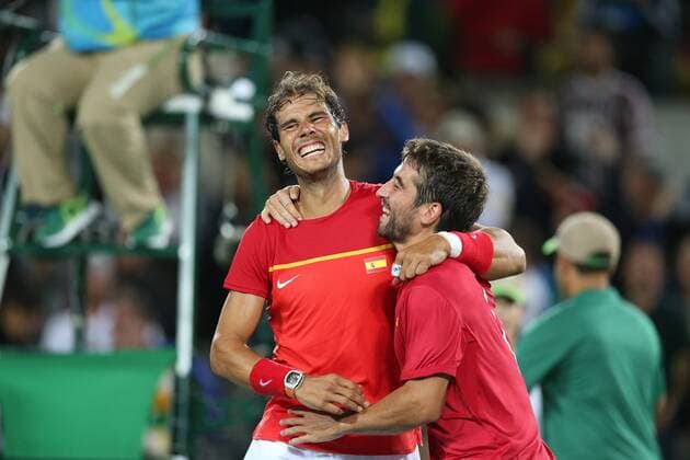 August 12, 2016 - Rio De Janeiro, Rio de Janeiro, Brazil - RJ - Olympic Tennis Games - SPORTS - Rafael Nadal and Marc Lopez of Spain celebrate winning the gold medal in the men s tennis doubles tennis tournament at the Olympic Center in the Olympic Games Olympische Spiele Olympia OS in Rio de Janeiro 2016 in Brazil, this sexta- Friday RIO 2016 - Tennis: Men™s - ZUMAb158