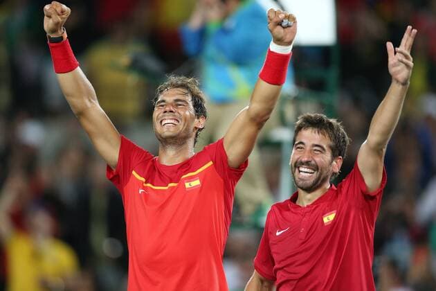 August 12, 2016 - Rio De Janeiro, Rio de Janeiro, Brazil - RJ - Olympic Tennis Games - SPORTS - Rafael Nadal and Marc Lopez of Spain celebrate winning the gold medal in the men s tennis doubles tennis tournament at the Olympic Center in the Olympic Games Olympische Spiele Olympia OS in Rio de Janeiro 2016 in Brazil, this sexta- Friday RIO 2016 - Tennis: Men™s - ZUMAb158
