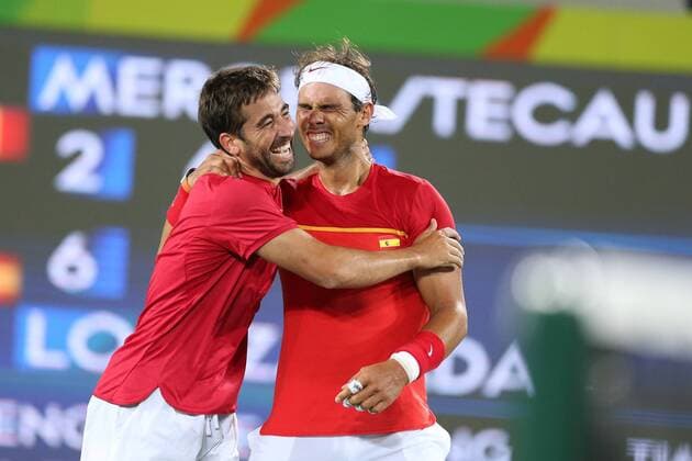 August 12, 2016 - Rio De Janeiro, Rio de Janeiro, Brazil - RJ - Olympic Tennis Games - SPORTS - Rafael Nadal and Marc Lopez of Spain celebrate winning the gold medal in the men s tennis doubles tennis tournament at the Olympic Center in the Olympic Games Olympische Spiele Olympia OS in Rio de Janeiro 2016 in Brazil, this sexta- Friday RIO 2016 - Tennis: Men™s - ZUMAb158