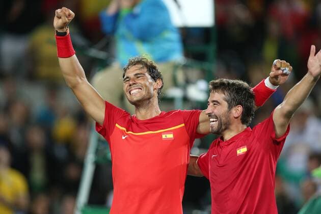 August 12, 2016 - Rio De Janeiro, Rio de Janeiro, Brazil - RJ - Olympic Tennis Games - SPORTS - Rafael Nadal and Marc Lopez of Spain celebrate winning the gold medal in the men s tennis doubles tennis tournament at the Olympic Center in the Olympic Games Olympische Spiele Olympia OS in Rio de Janeiro 2016 in Brazil, this sexta- Friday RIO 2016 - Tennis: Men™s - ZUMAb158