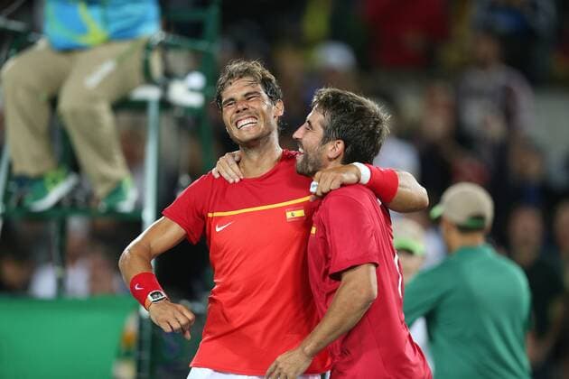 August 12, 2016 - Rio De Janeiro, Rio de Janeiro, Brazil - RJ - Olympic Tennis Games - SPORTS - Rafael Nadal and Marc Lopez of Spain celebrate winning the gold medal in the men s tennis doubles tennis tournament at the Olympic Center in the Olympic Games Olympische Spiele Olympia OS in Rio de Janeiro 2016 in Brazil, this sexta- Friday RIO 2016 - Tennis: Men™s - ZUMAb158