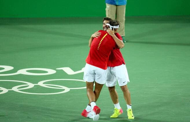 Aug 12, 2016 - Rio de Janeiro, Brazil - RAFAEL NADAL and MARC LOPEZ of Spain react to winning gold in Men s Doubles Tennis competition at the 2016 Rio Summer Olympic Games Olympische Spiele Olympia OS RIO 2016 - Tennis: Men s - ZUMAg209