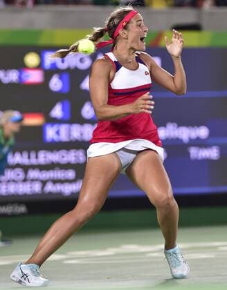 (160813) -- RIO DE JANEIRO, Aug. 13, 2016 -- Puerto Rico s Monica Puig celebrates during the women s singles gold medal match of Tennis against Germany s Angelique Kerber at the 2016 Rio Olympic Games Olympische Spiele Olympia OS in Rio de Janeiro, Brazil, on Aug. 13, 2016. Monica Puig won 2-1. ) (xr) (SP)BRAZIL-RIO DE JANEIRO-OLYMPICS-TENNIS YuexYuewei 
