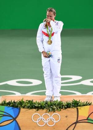 (160813) -- RIO DE JANEIRO, Aug. 13, 2016 -- Puerto Rico s Monica Puig reacts during the awarding ceremony for the women s singles final of Tennis at the 2016 Rio Olympic Games Olympische Spiele Olympia OS in Rio de Janeiro, Brazil, on Aug. 13, 2016. Monica Puig won the gold medal. ) (xr) (SP)BRAZIL-RIO DE JANEIRO-OLYMPICS-TENNIS ChengxMin 