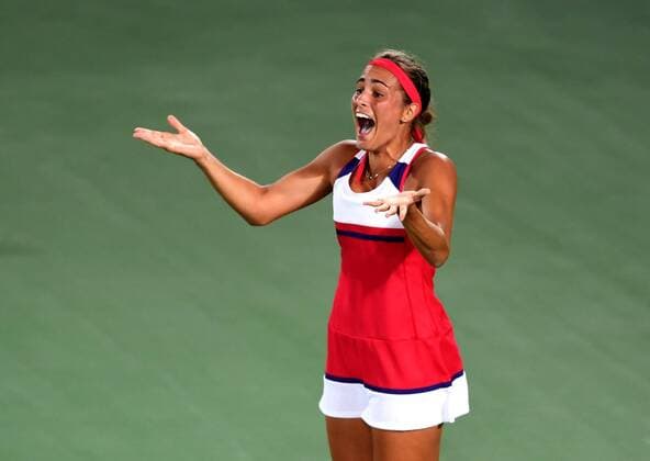 (160813) -- RIO DE JANEIRO, Aug. 13, 2016 -- Puerto Rico s Monica Puig reacts after the women s singles gold medal match of Tennis against Germany s Angelique Kerber at the 2016 Rio Olympic Games Olympische Spiele Olympia OS in Rio de Janeiro, Brazil, on Aug. 13, 2016. Monica Puig won 2-1. ) (xr) (SP)BRAZIL-RIO DE JANEIRO-OLYMPICS-TENNIS ChengxMin 