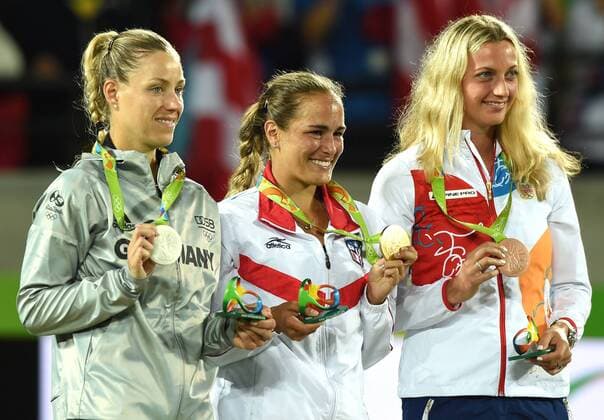 (160813) -- RIO DE JANEIRO, Aug. 13, 2016 -- Gold medalist Puerto Rico s Monica Puig (C), silver medalist Germany s Angelique Kerber (L), bronze medalist Czech Republic s Petra Kvitova attend the awarding ceremony for the women s singles final of Tennis at the 2016 Rio Olympic Games Olympische Spiele Olympia OS in Rio de Janeiro, Brazil, on Aug. 13, 2016. ) (xr) (SP)BRAZIL-RIO DE JANEIRO-OLYMPICS-TENNIS YuexYuewei 