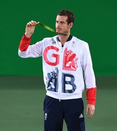 (160814) -- RIO DE JANEIRO, Aug. 14, 2016 -- Andy Murray of Great Britain shows the gold medal at the awarding ceremony of the men s tennis singles match at the 2016 Rio Olympic Games Olympische Spiele Olympia OS in Rio de Janeiro, Brazil, on Aug. 14, 2016. Andy Murray won the gold medal. )(dh) (SP)BRAZIL-RIO DE JANEIRO-OLYMPICS-TENNIS ChengxMin 