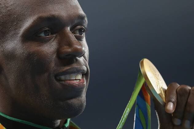 Rio 2016, Leichtathletik, 100m der Herren, Usain Bolt während der Siegerehrung OLYMPICS - Olympic Summer Games 2016 RIO DE JANEIRO,BRAZIL,15.AUG.16 - OLYMPICS, ATHLETICS - Olympic Summer Games Rio 2016, 100m, men, award ceremony. Image shows Usain Bolt (JAM). Keywords: medal. GEPAxpictures xChristianxWalgram